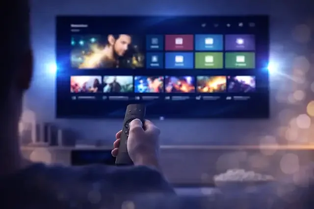 Choosing a channel from the program guide with the remote